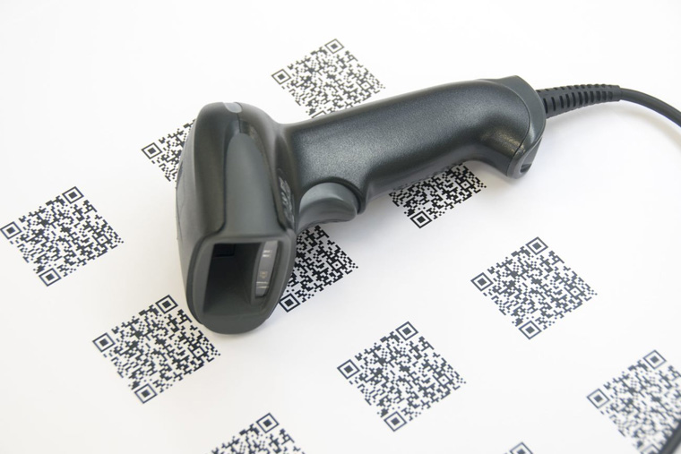 barcode scanner placed on top of QR codes